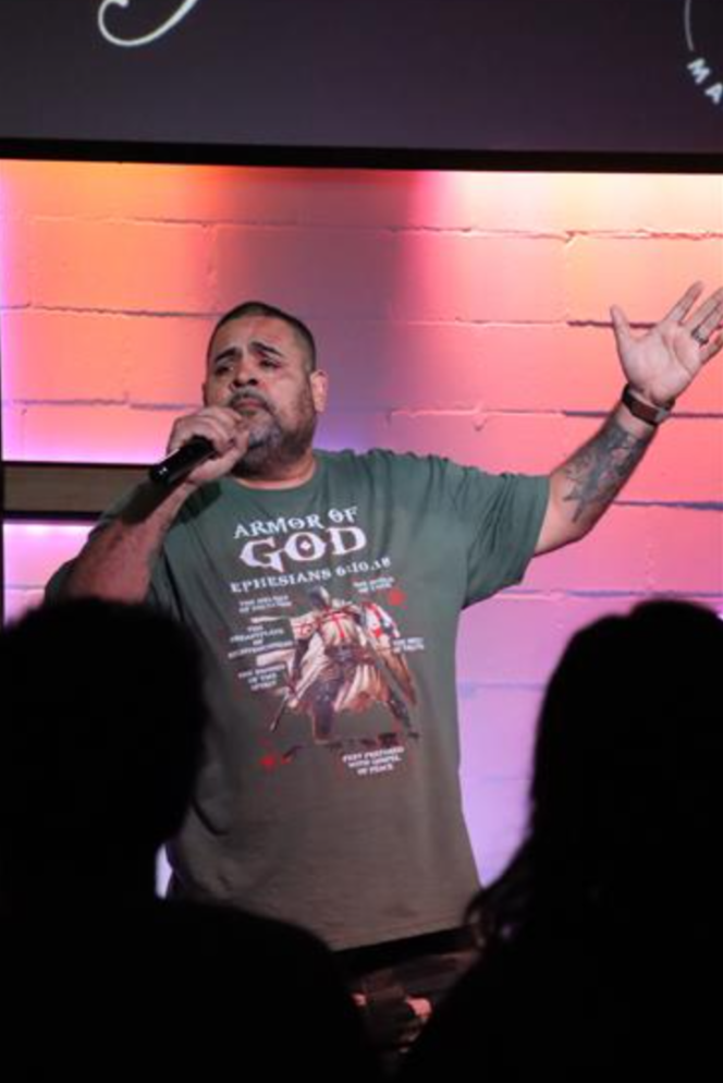 Pastor Moses Quiles preaching